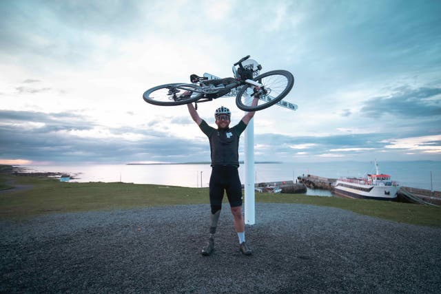 Amputee and Cornwall native Stuart Croxford has completed his gruelling 2000km charity cycle the length of the UK. (Stuart Croxford/PA)