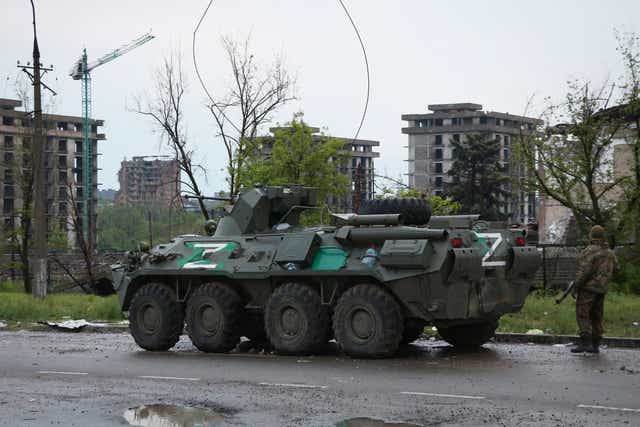 <p>An APC of Donetsk People’s Republic militia stands not far from Mariupol’s besieged Azovstal steel plant</p>