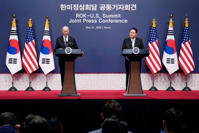 <p>US president Joe Biden speaks as South Korea’s Yoon Suk-yeol listens during a news conference at the People's House inside the Ministry of National Defense in Seoul on Saturday</p>