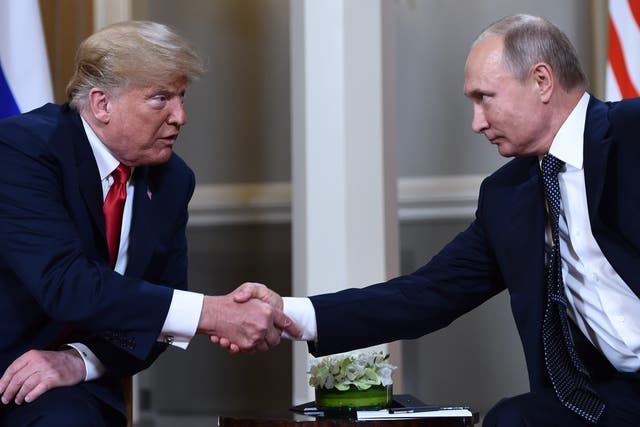<p>Putin and US President Donald Trump shake hands before a meeting in Helsinki, on July 16, 2018</p>