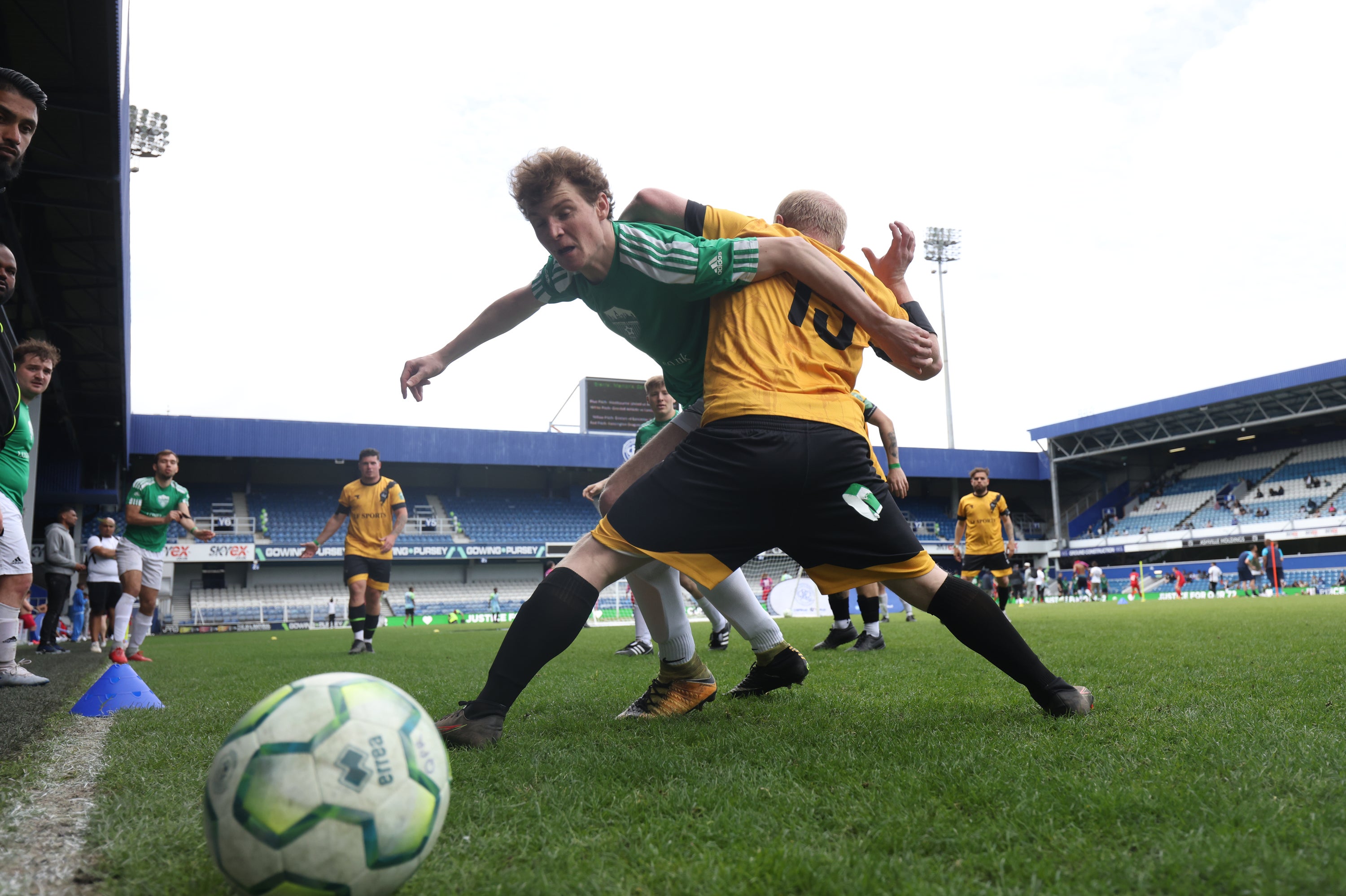 AFC South London player Theo Cox (left), tackles during a match against Westbourne United at the Grenfell Memorial Cup (James Manning/PA)