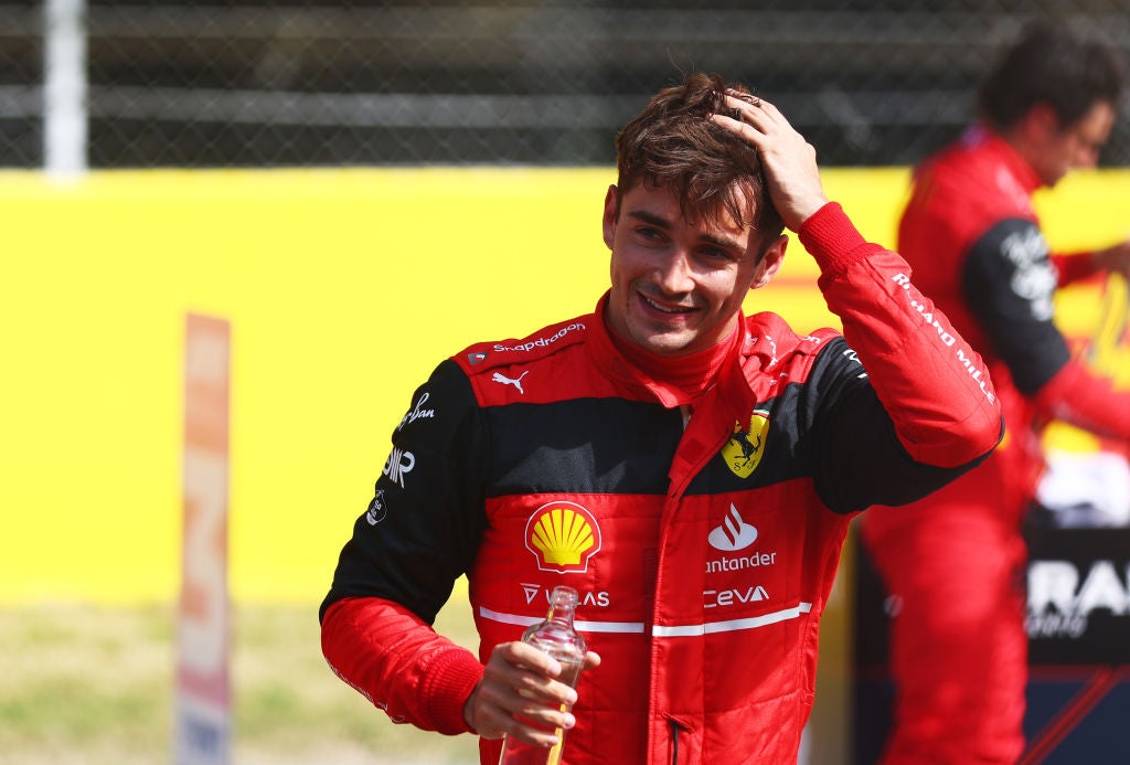 Pole position qualifier Charles Leclerc of Monaco and Ferrari smiles in parc ferme during qualifying ahead of the F1 Grand Prix of Spain at Circuit de Barcelona-Catalunya on Saturday