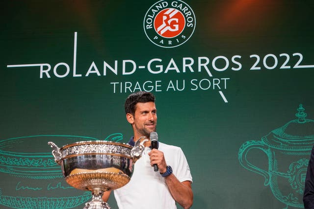 Novak Djokovic is looking to defend his French Open title (Michel Euler/AP)