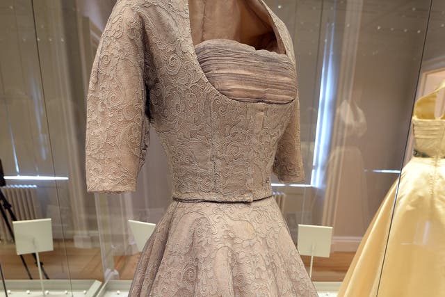 A grey lace dress worn by Princess Margaret in 1952, the same year that Aviva looked at in its archives to mark the Platinum Jubilee (John Stillwell/PA Archive)
