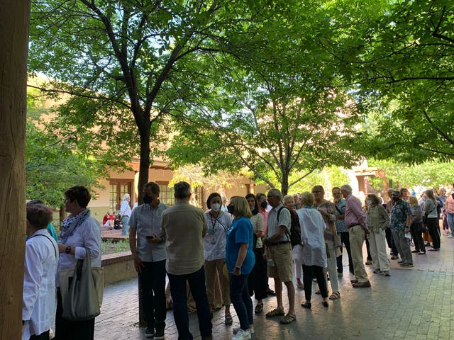<p>Festival goers queue for a talk at the Santa Fe Literary Festival </p>