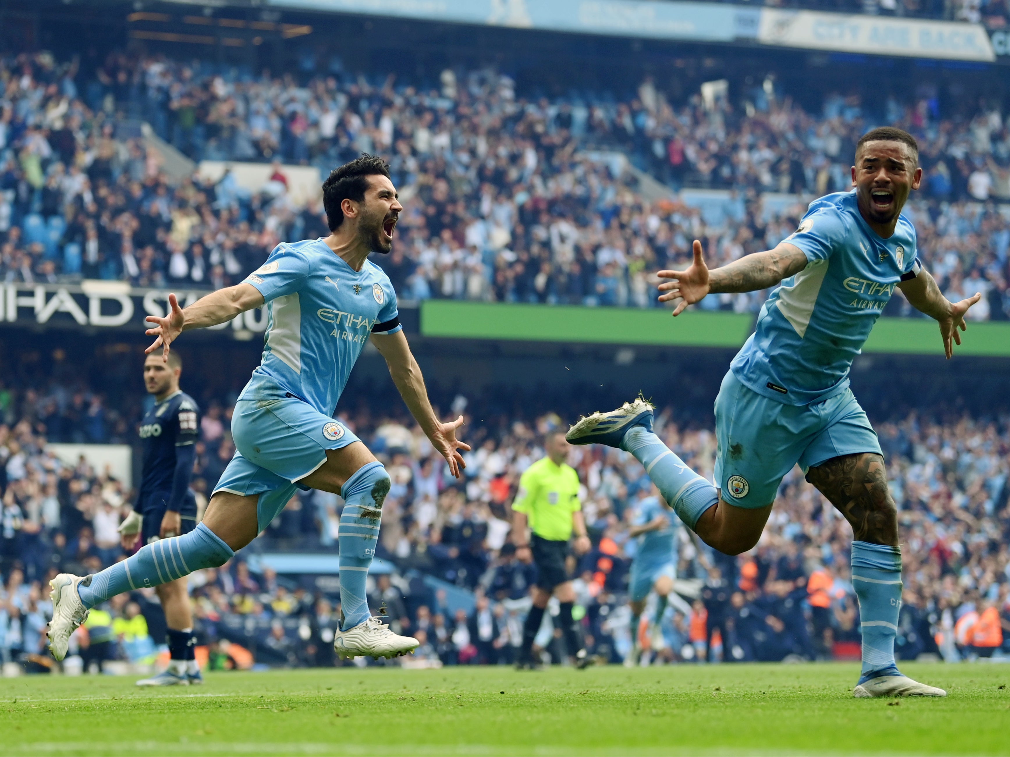 Gundogan (left) scored twice in a stunning conclusion to the game