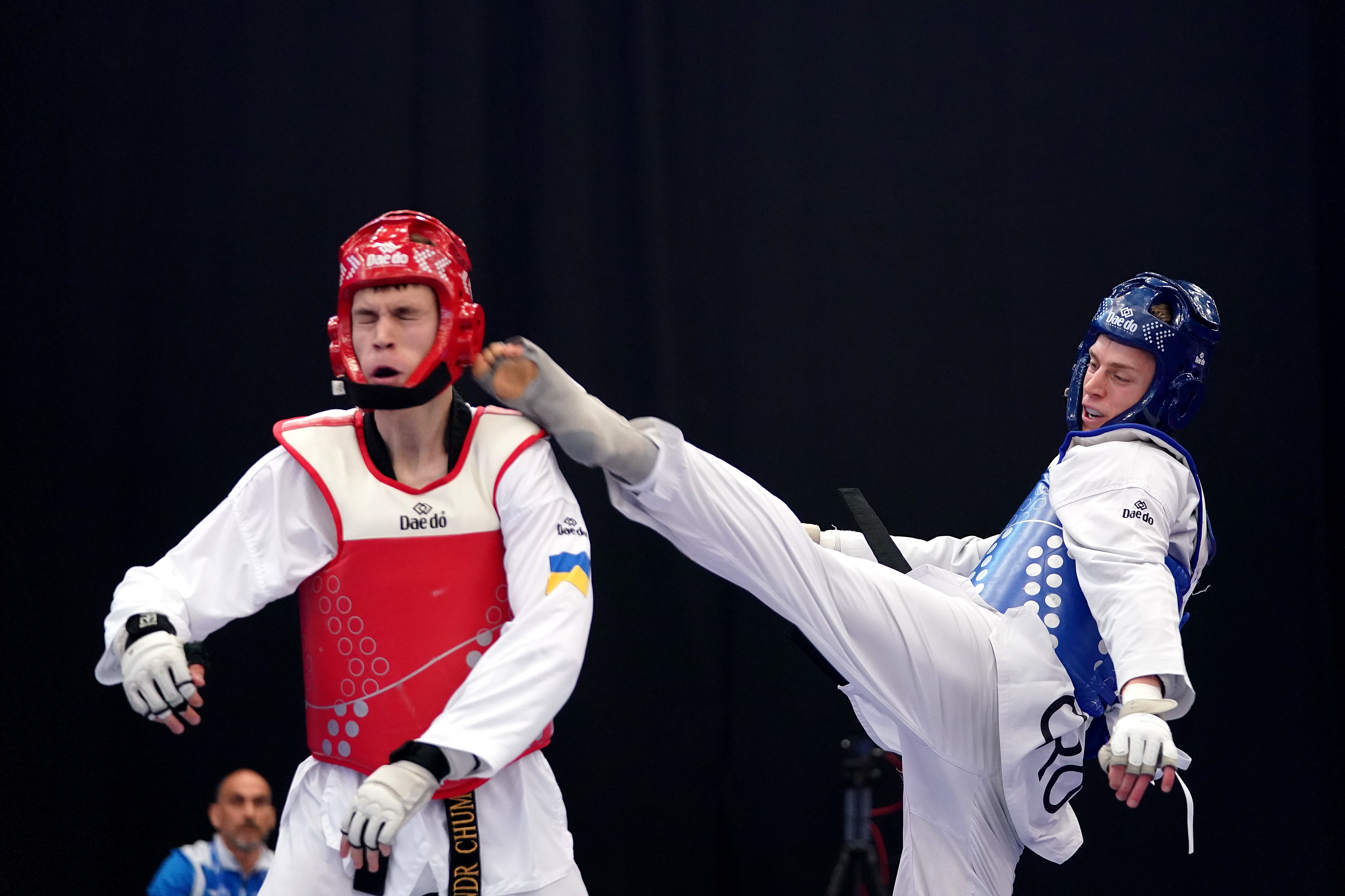 Croatia’s Marko Golubic, right, in action against Ukraine’s Oleksandr Chumachenko during day four of the European Taekwondo Championships at the Manchester Regional Arena (Zac Goodwin/PA)