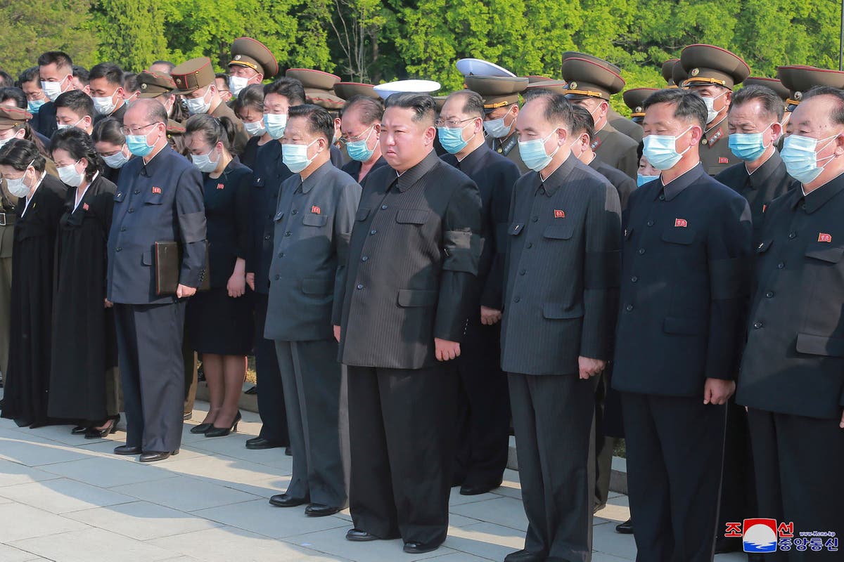 Maskless Kim Jong-un gathers large crowd for state funeral despite major Covid outbreak