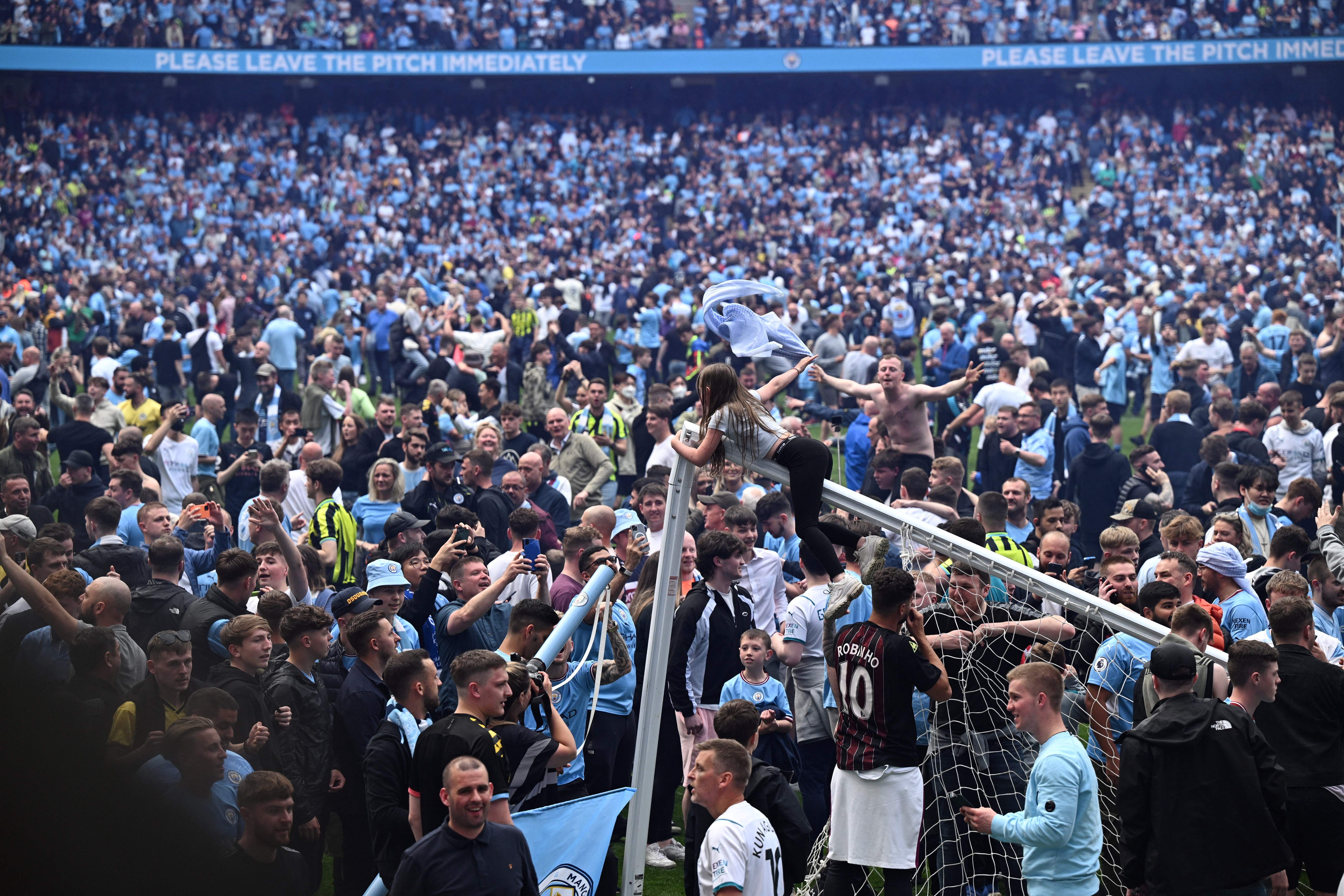 A large number of Manchester City fans entered the pitch after Pep Guardiola’s side secured the Premier League title