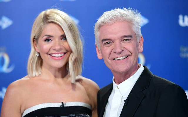 <p>Holly Willoughby and Phillip Schofield will host This Morning live from Buckingham Palace (Ian West/PA)</p>