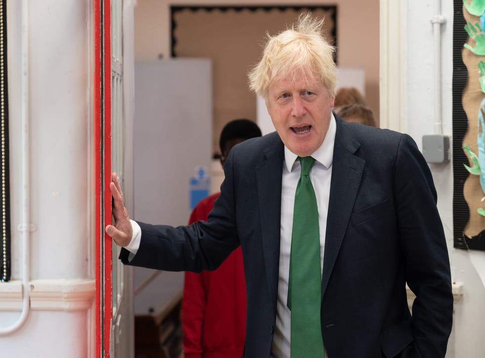 Prime Minister Boris Johnson during a visit to St Mary Cray Primary Academy, in Orpington, to see how they are delivering tutoring to help children catch up following the pandemic (Stefan Rousseau/PA)