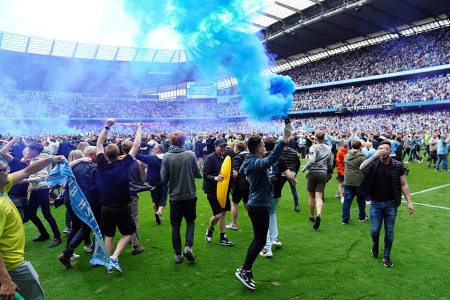 The Prime Minister’s official spokesman has called a pitch invasion at Manchester City’s ground ‘concerning’ (Martin Rickett/PA)