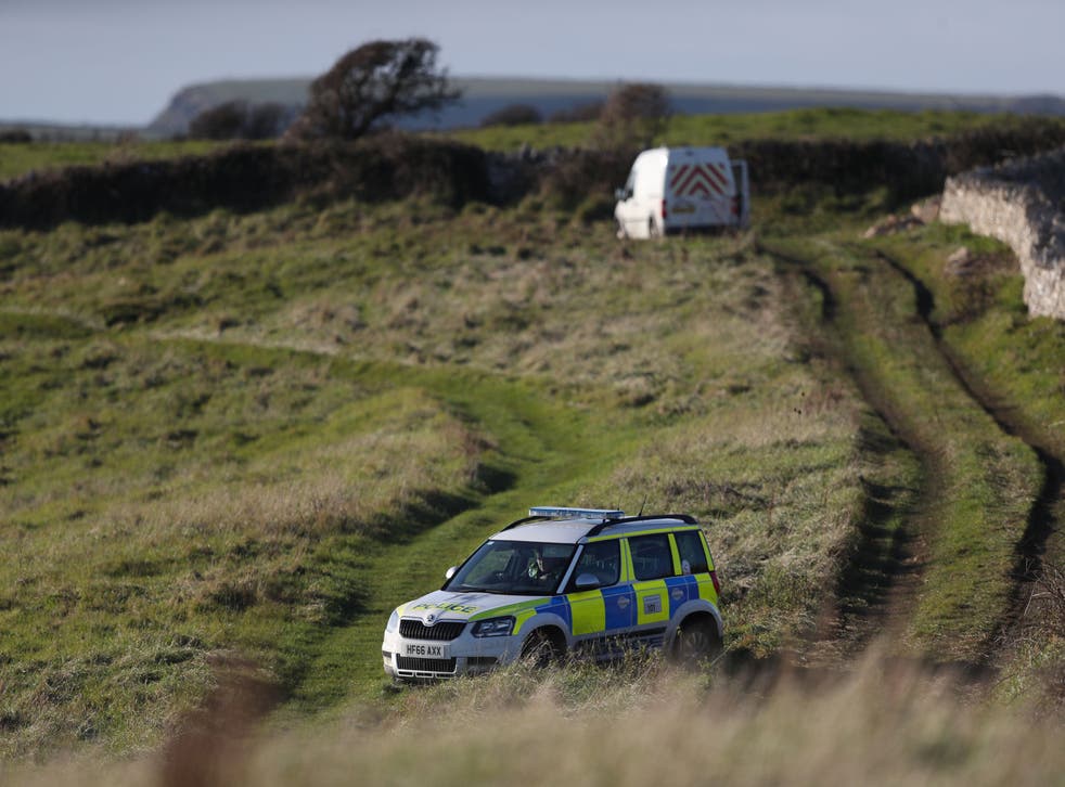 Police activity on a costal path near Swanage, Dorset as a body has been discovered in the hunt for the missing 19-year-old Gaia Pope.