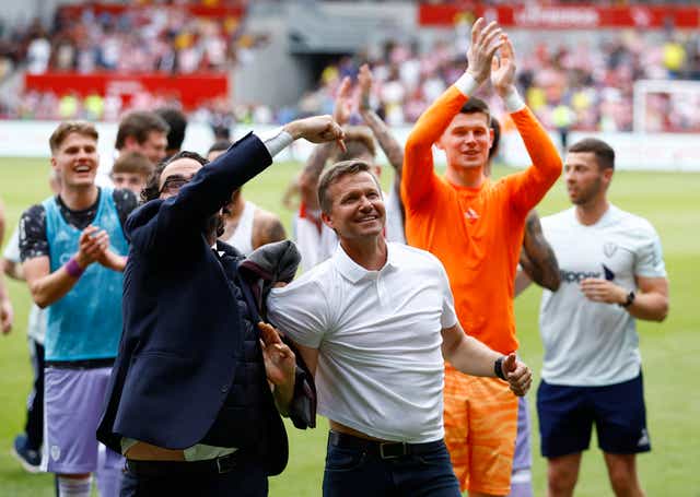 <p>Leeds manager Jesse Marsch celebrates with director of football Victor Orta</p>