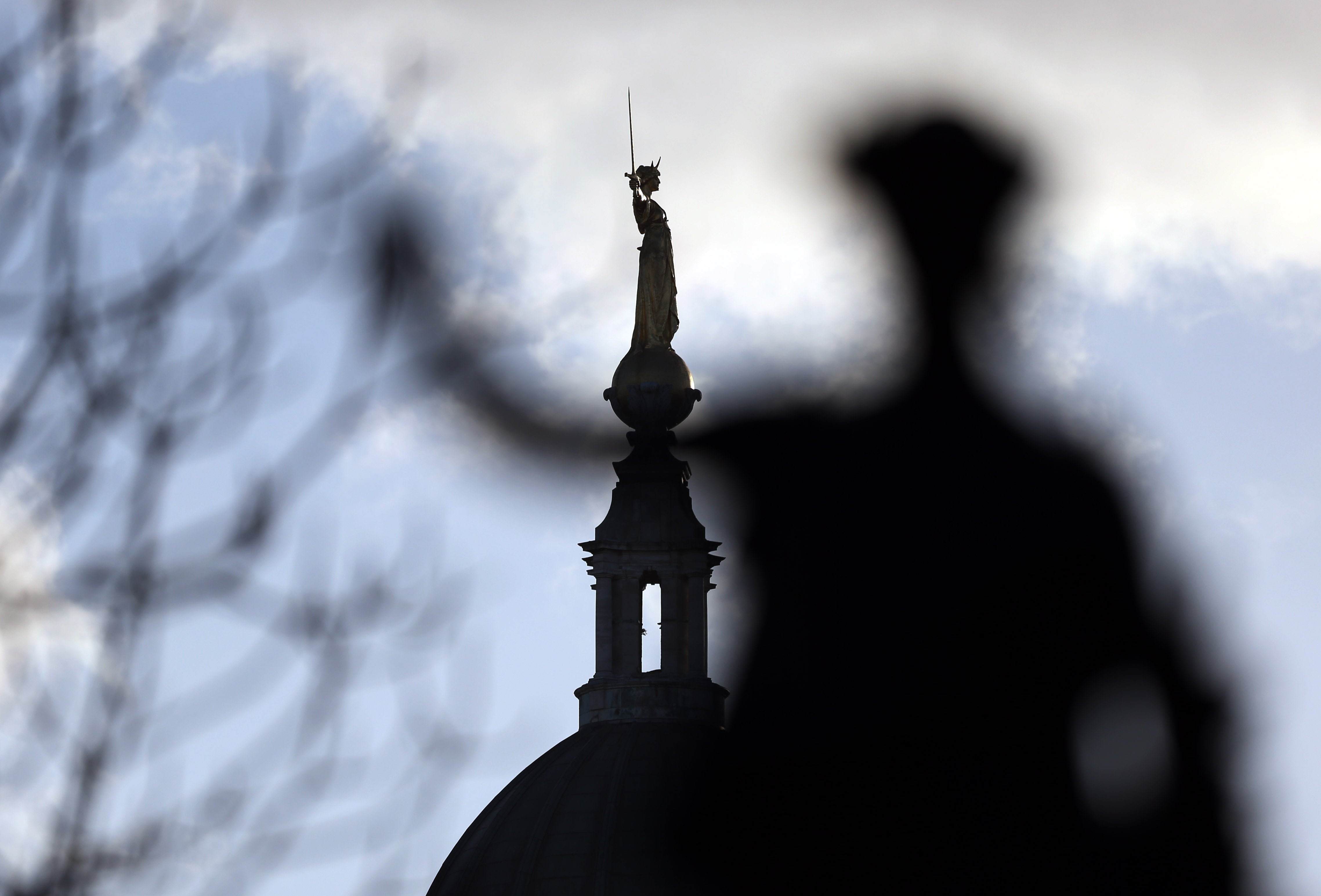 FW Pomeroy’s Statue of Justice stands atop the Central Criminal Court building, Old Bailey, London (Jonathan Brady/PA)