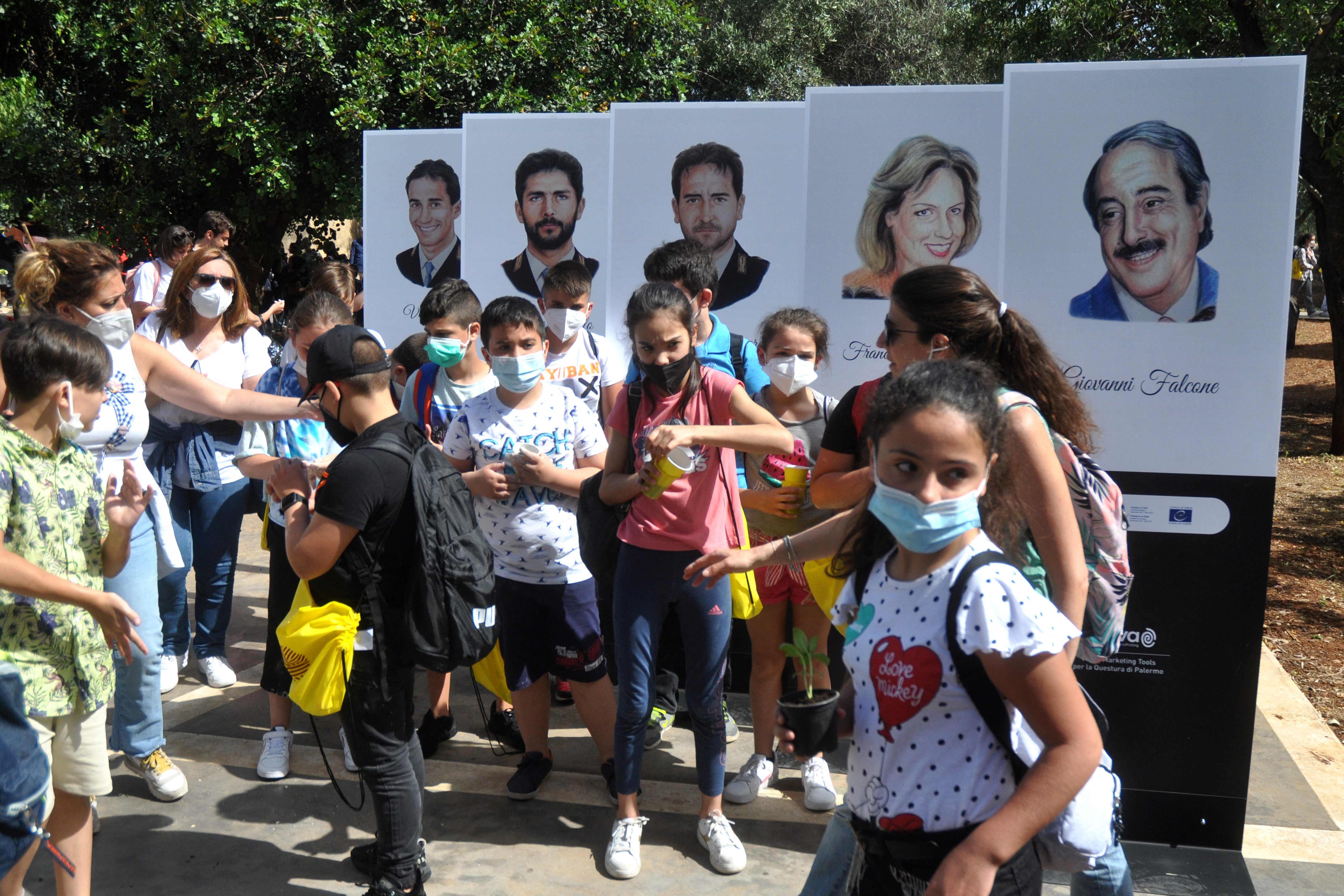 PBanners depicting late anti-mafia judge Giovanni Falcone, his wife Francesca Morvillo and their bodyguards