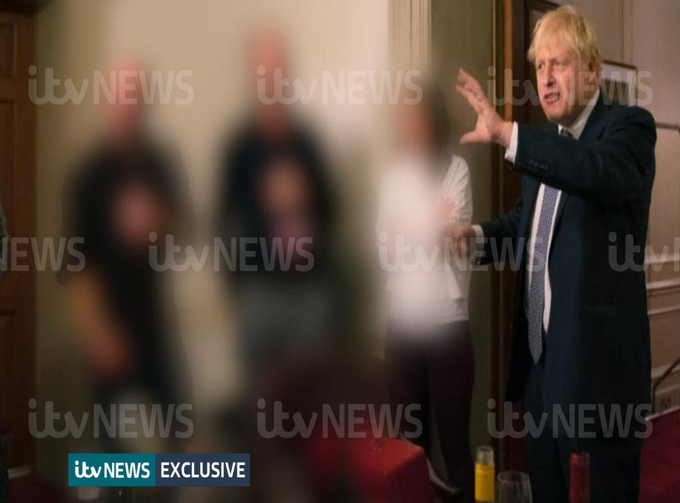 A photograph obtained by ITV News of the Prime Minister raising a glass at a leaving party on 13th November 2020 (ITV/PA)