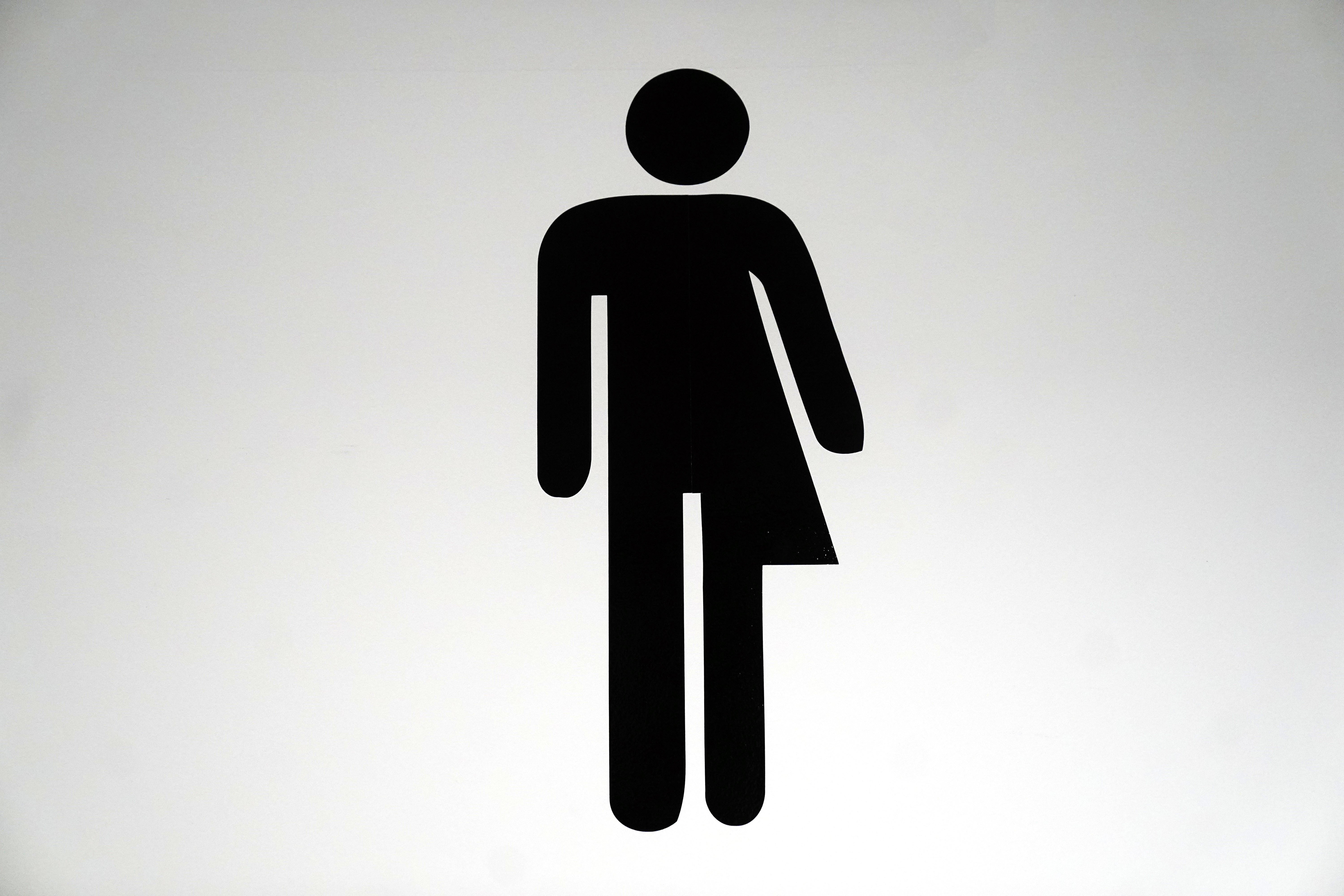 A sign for unisex non-binary gender neutral toilets in southwest London (Victoria Jones/PA)