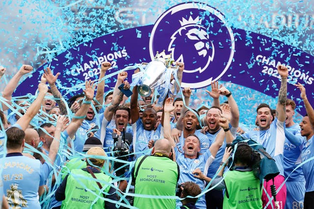 Manchester City’s players celebrate (Martin Rickett/PA)
