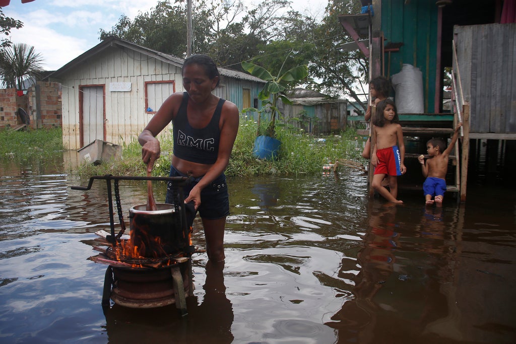 People in Brazil’s Amazon rainforest again reel from floods