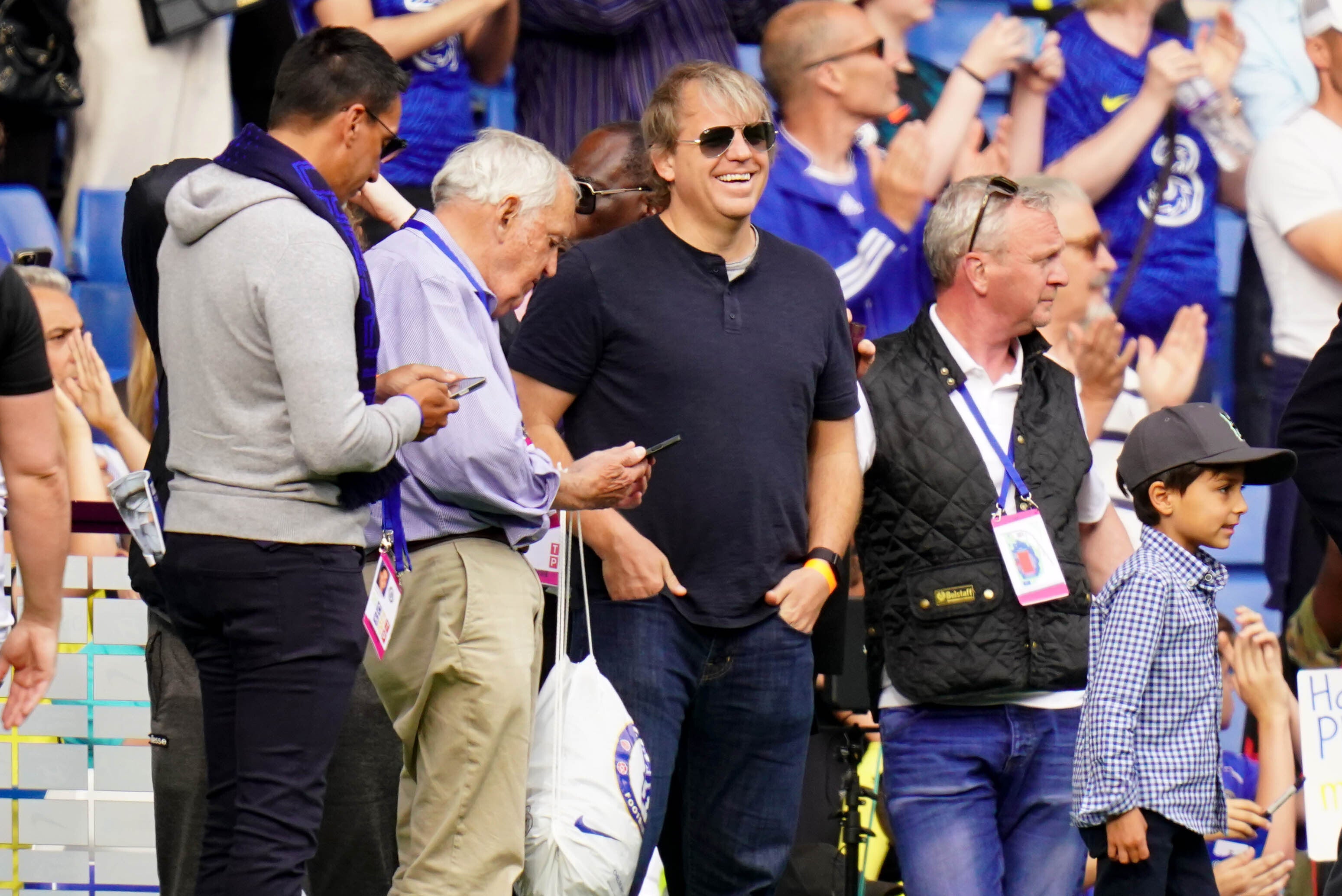 Todd Boehly, centre, with Hansjorg Wyss, second left, who are both part of the consortium poised to complete the Chelsea takeover (Adam Davy/PA)