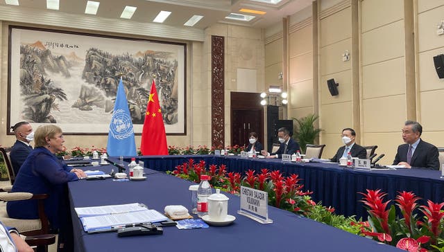 <p>UN human rights chief Michelle Bachelet (left) speaks with China’s Foreign Minister Wang Yi (right) during their meeting in the southern Chinese city of Guangzhou on 23 May </p>