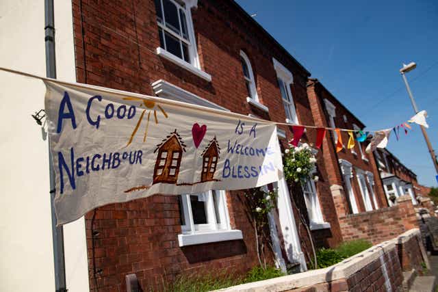 Duncombe Street in Wollaston, where artist Luke Perry hung bunting with messages of support (Jacob King/PA)