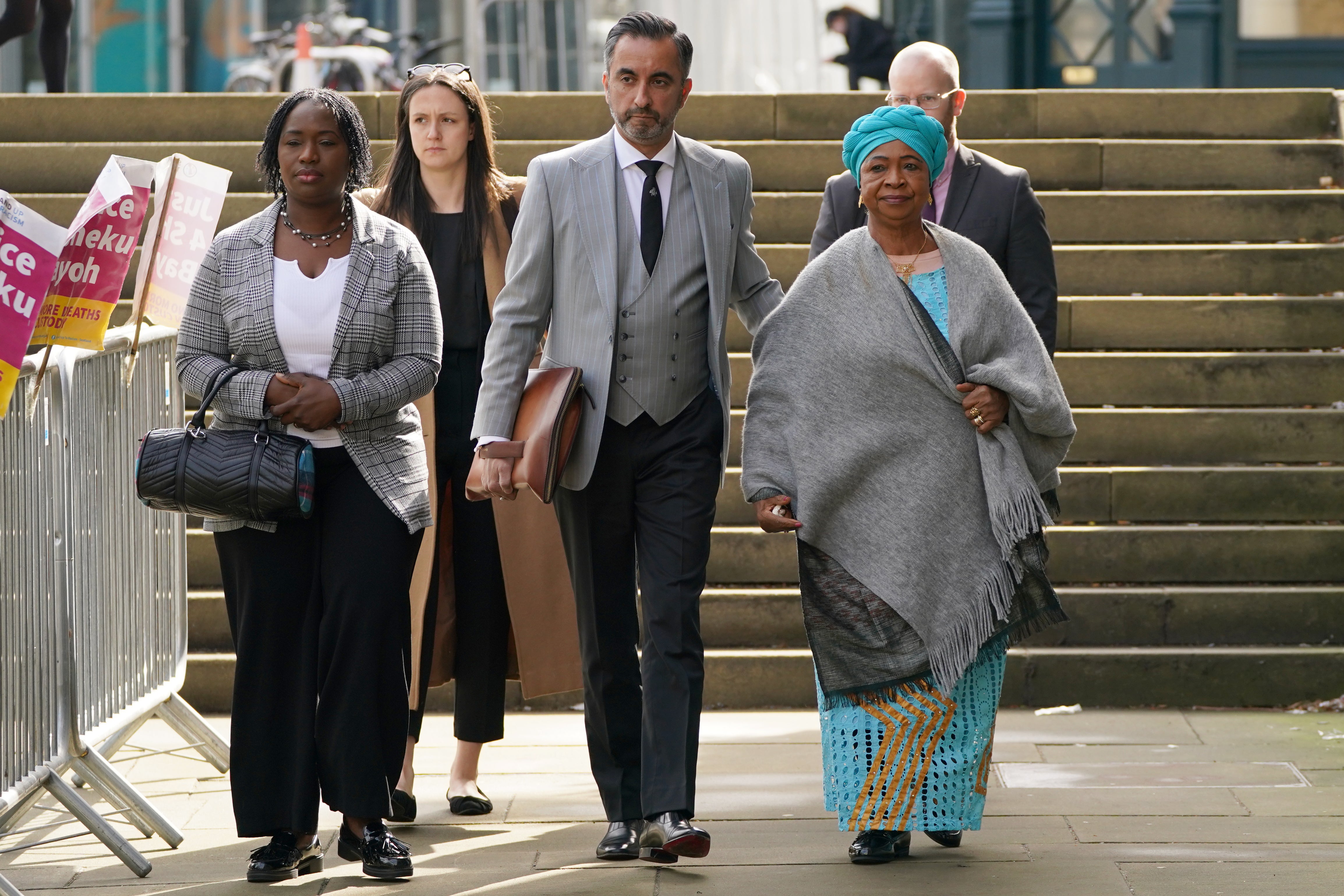 Kadi Johnson (left) and Aminata Bayoh arrive with family lawyer Aamer Anwar (Andrew Milligan/PA)