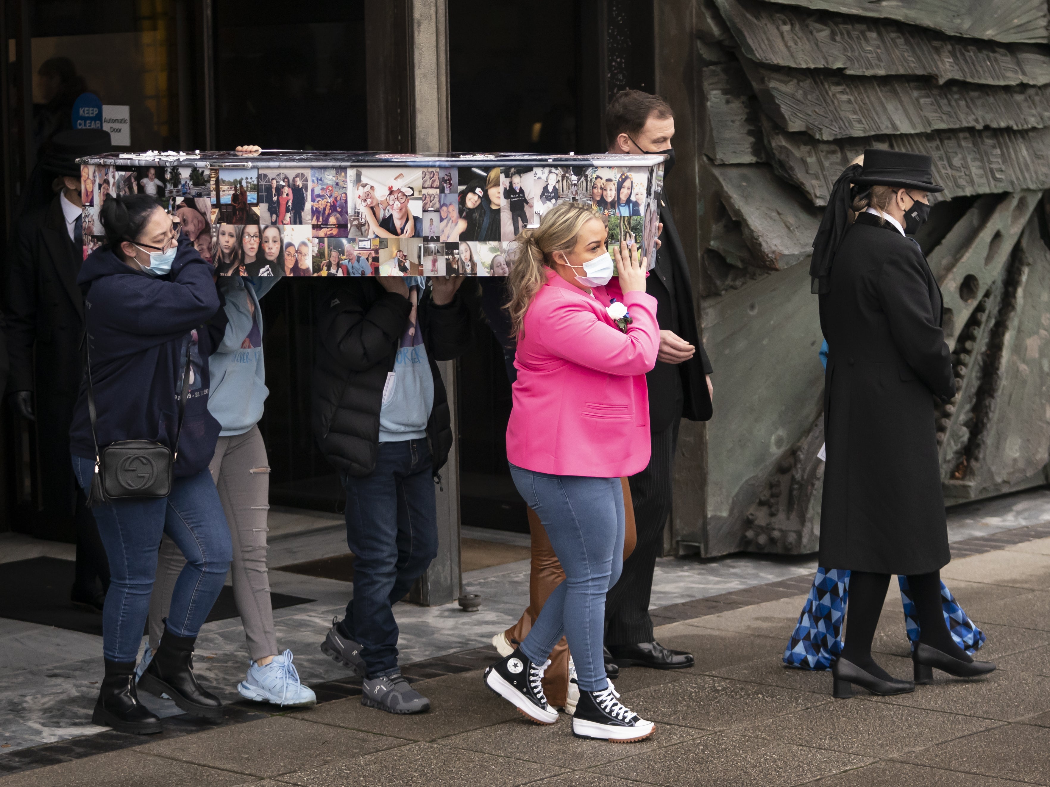 The coffin of Ava White is carried out of Liverpool Metropolitan Cathedral following her funeral (Danny Lawson/PA)
