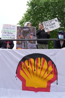 Three arrested after climate protesters take over Shell shareholder meeting