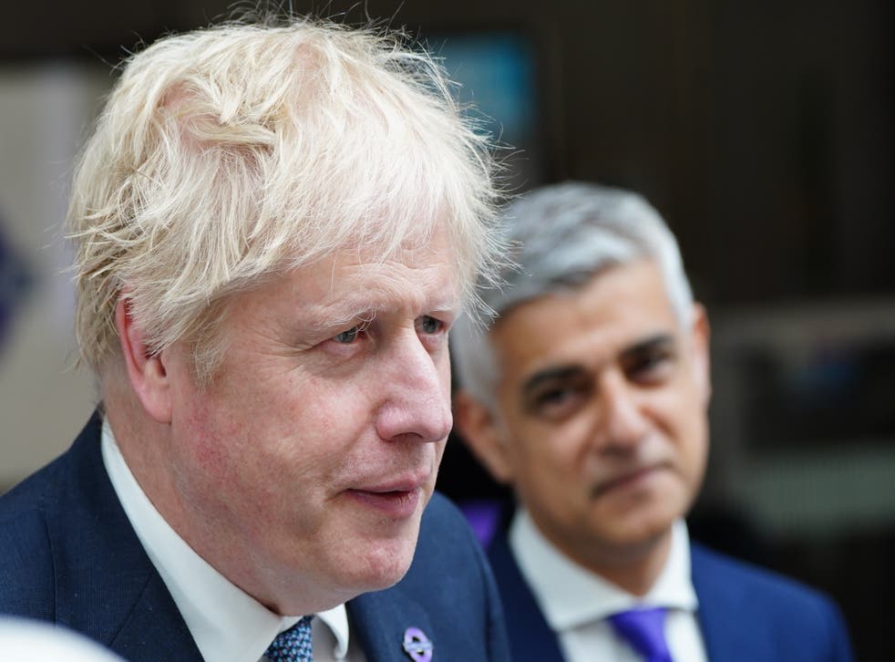 Prime Minister Boris Johnson (left) and Mayor of London Sadiq Khan at Paddington station in London, to mark the completion of London’s Crossrail project (PA)