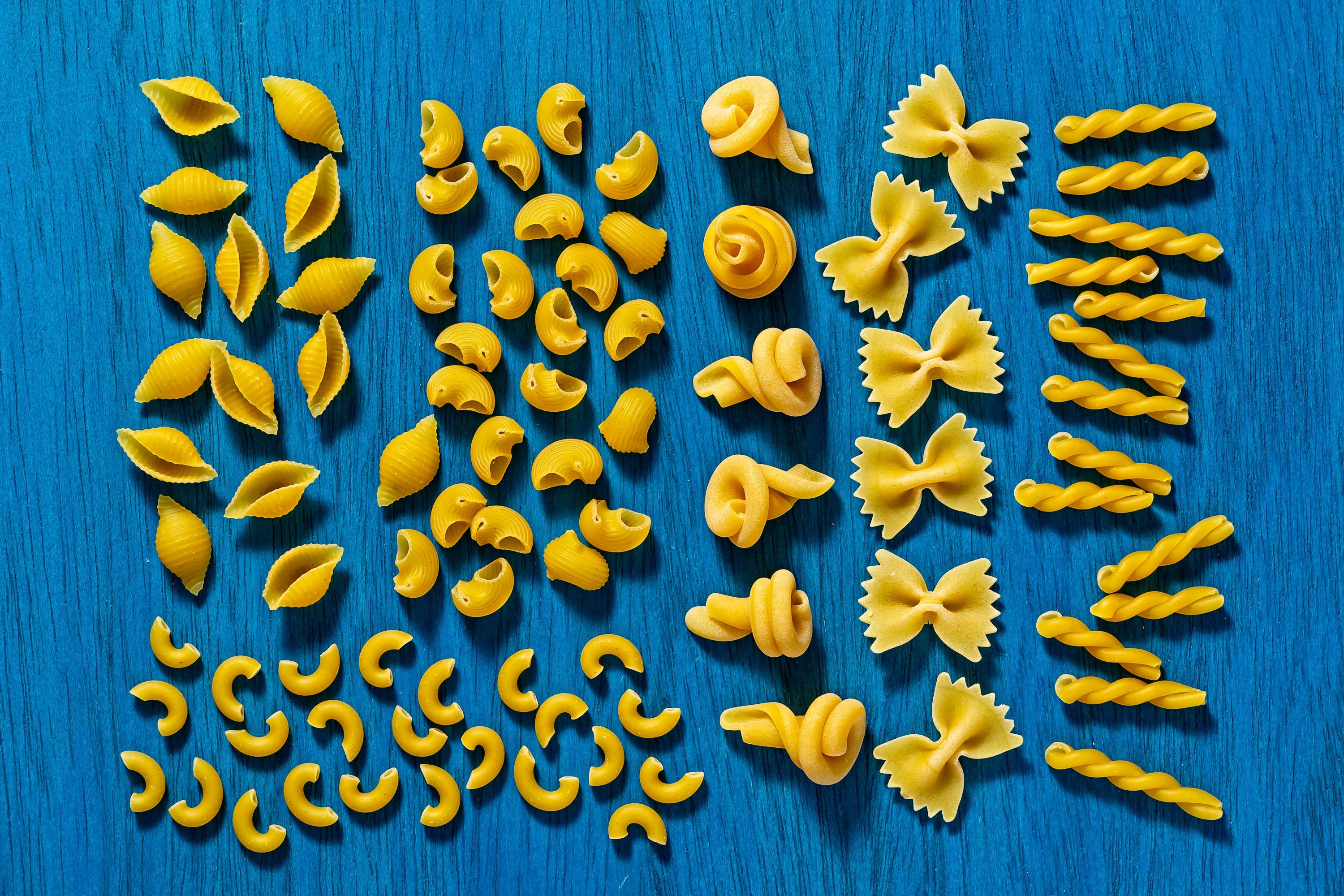 Top, from left, conchiglie, pipette, trottole, farfalle, gemelli. Bottom left, elbow macaroni