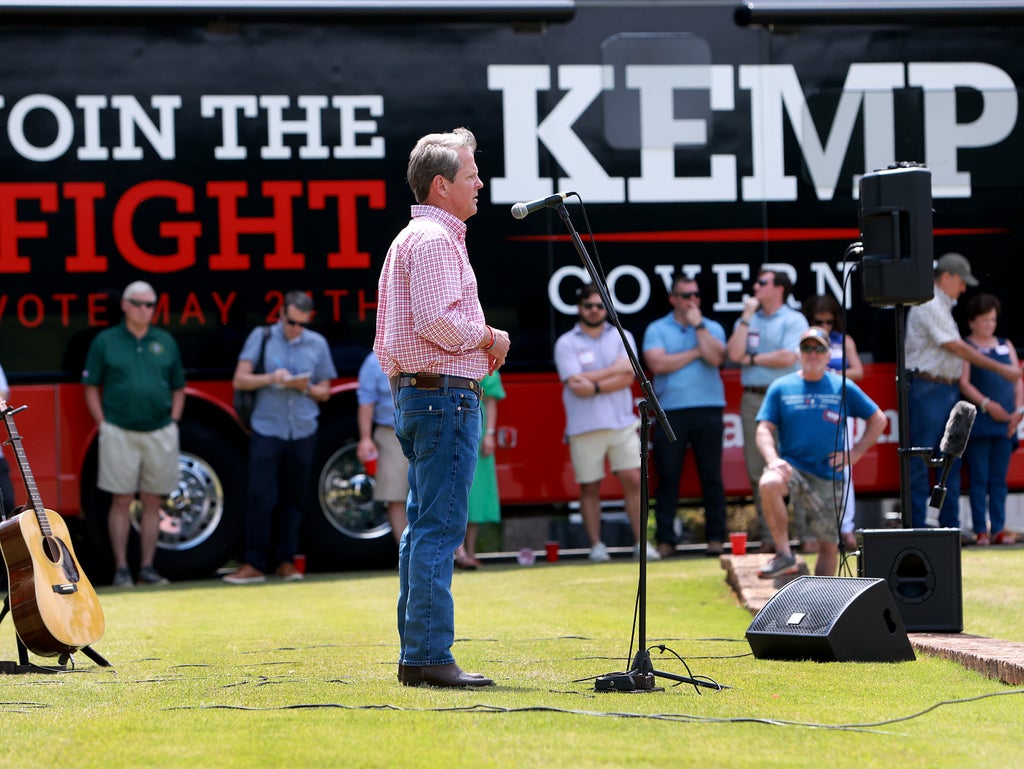 Georgia election results – live: Trump foe Brian Kemp wins primary as Herschel Walker secures GOP Senate nom