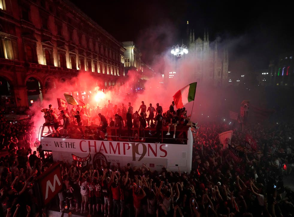 AC Milan celebrated their title win with a bus parade through the city (AP Photo/Luca Bruno)
