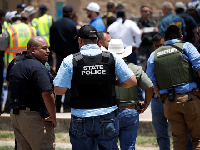 <p>Law enforcement personnel guard the scene of a suspected shooting near Robb Elementary School in Uvalde, Texas on Tuesday </p>