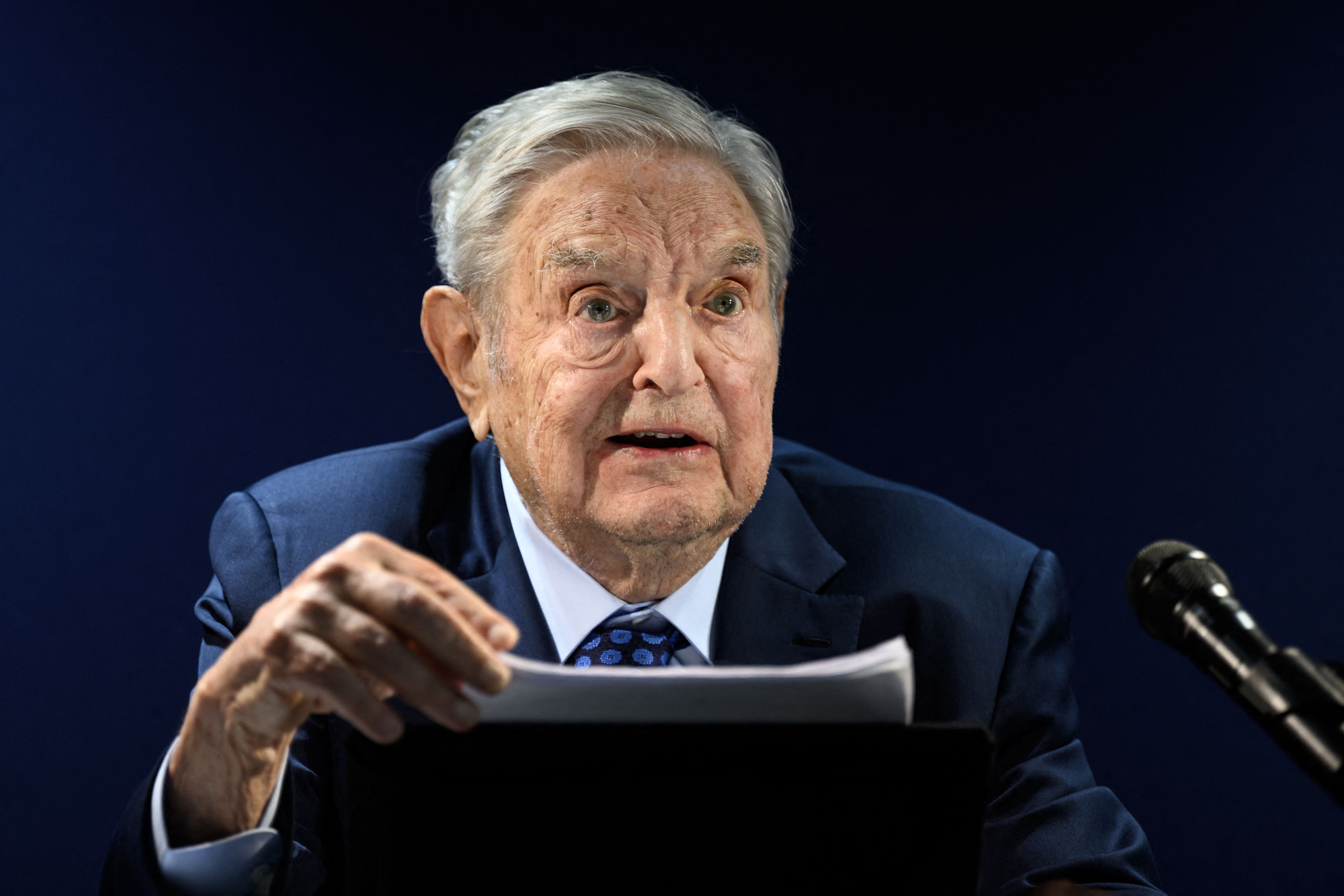 George Soros addresses the assembly on the sidelines of the World Economic Forum (WEF) meeting in Davos on Tuesday