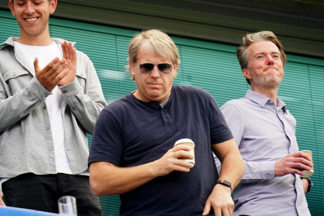 <p>Todd Boehly, centre, at Chelsea’s game against Watford on Sunday </p>