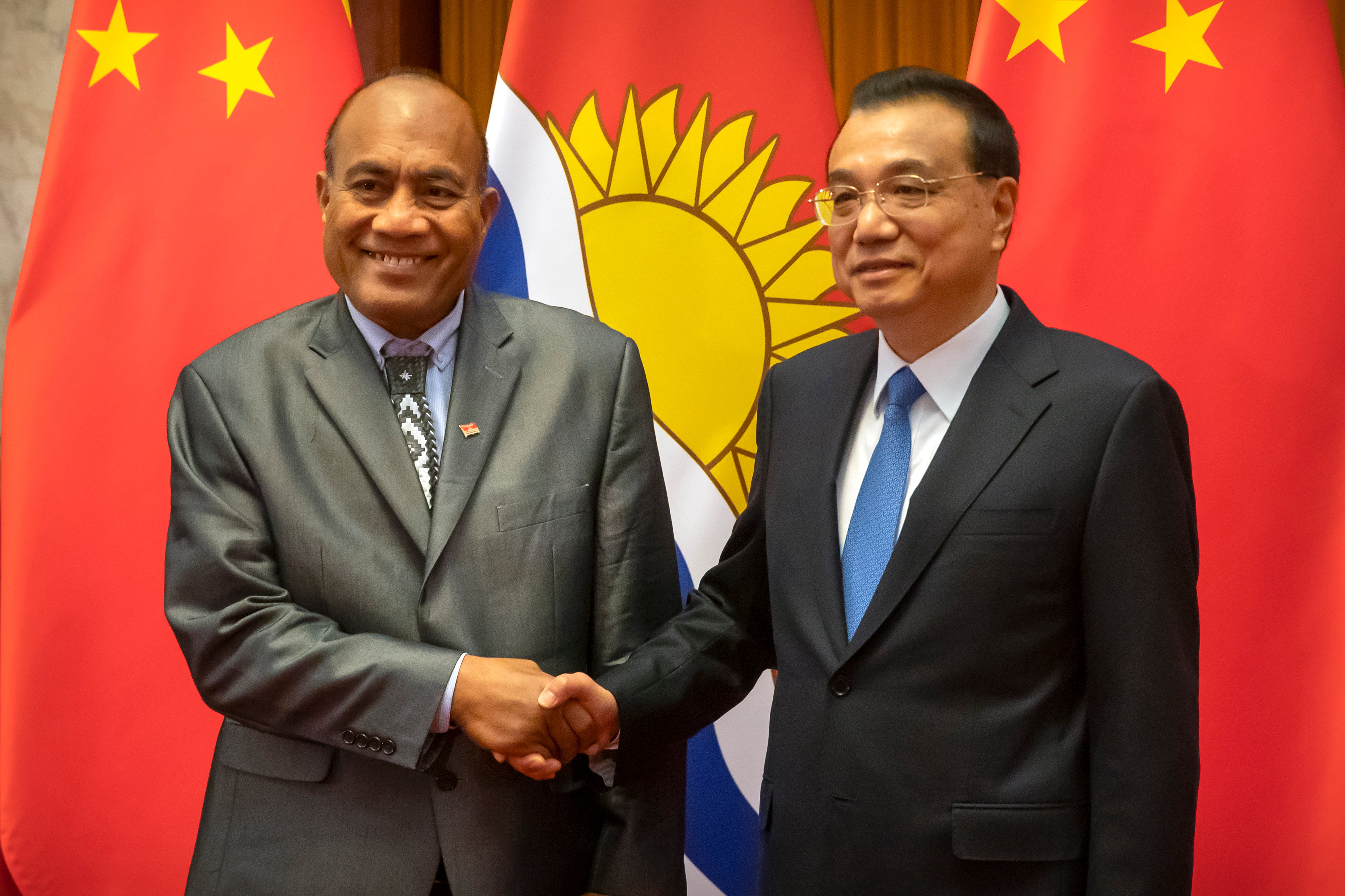 <p>File. Kiribati’s president Taneti Maamau, left, and former Chinese premier, Li Keqiang, pose for a photo before a meeting at the Great Hall of the People in Beijing, Monday, 6 January 2020</p>