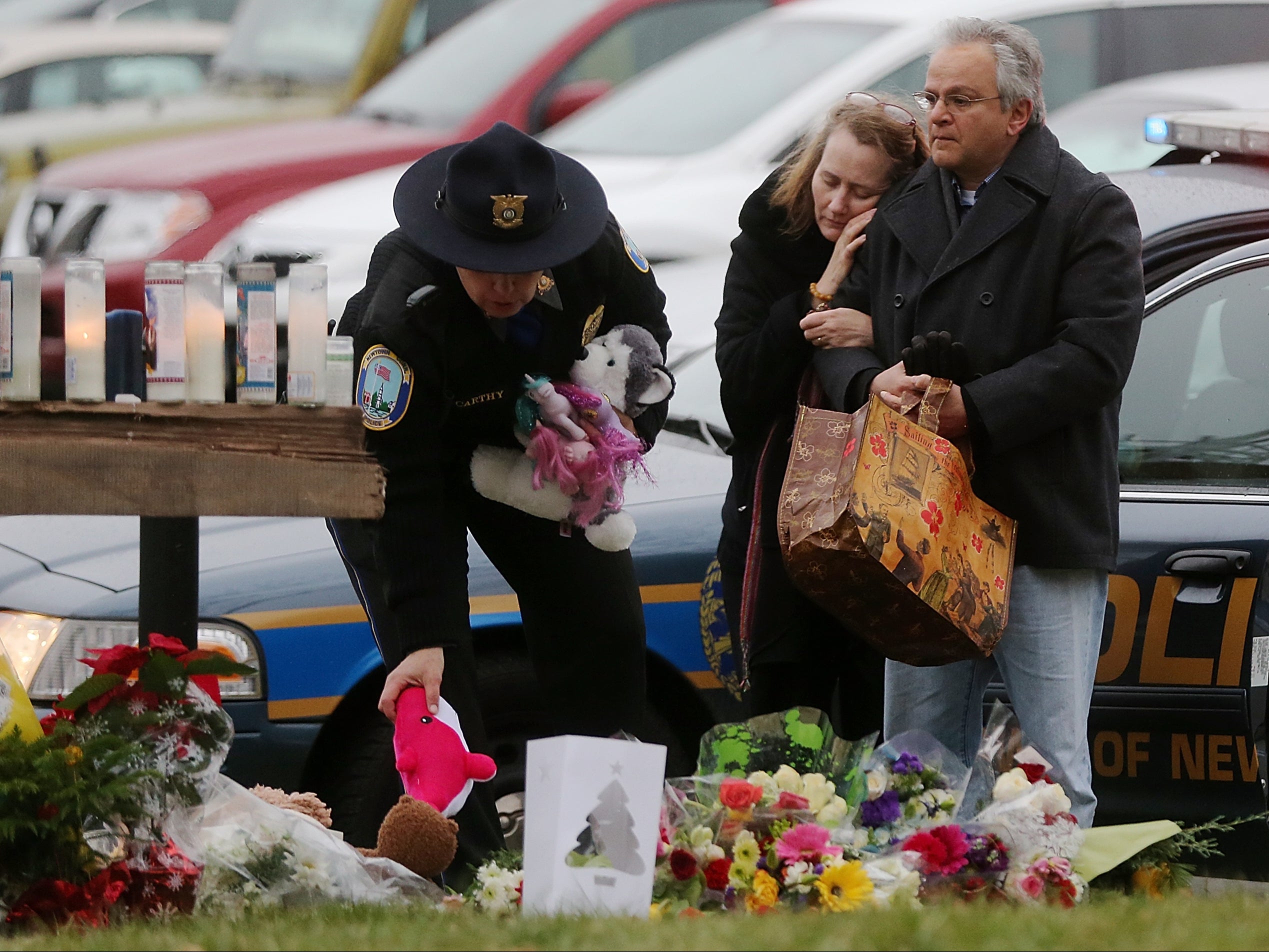 Mourners gather following the Sandy Hook school shooting