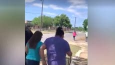 Parents seen running towards primary Texas school during shooting that killed 19 children