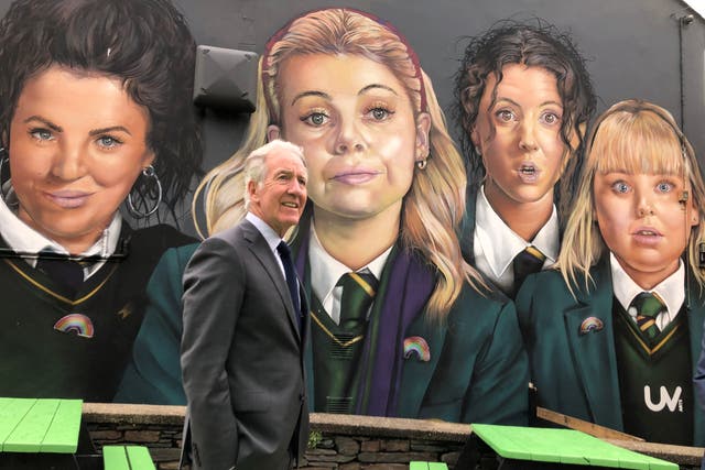 Congressman Richard Neal visits the Derry Girls mural as he leads a Congressional delegation on a visit to Londonderry (David Young/PA)