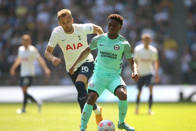 <p>Tariq Lamptey in action against Tottenham’s Harry Kane (Nigel French/PA Images).</p>