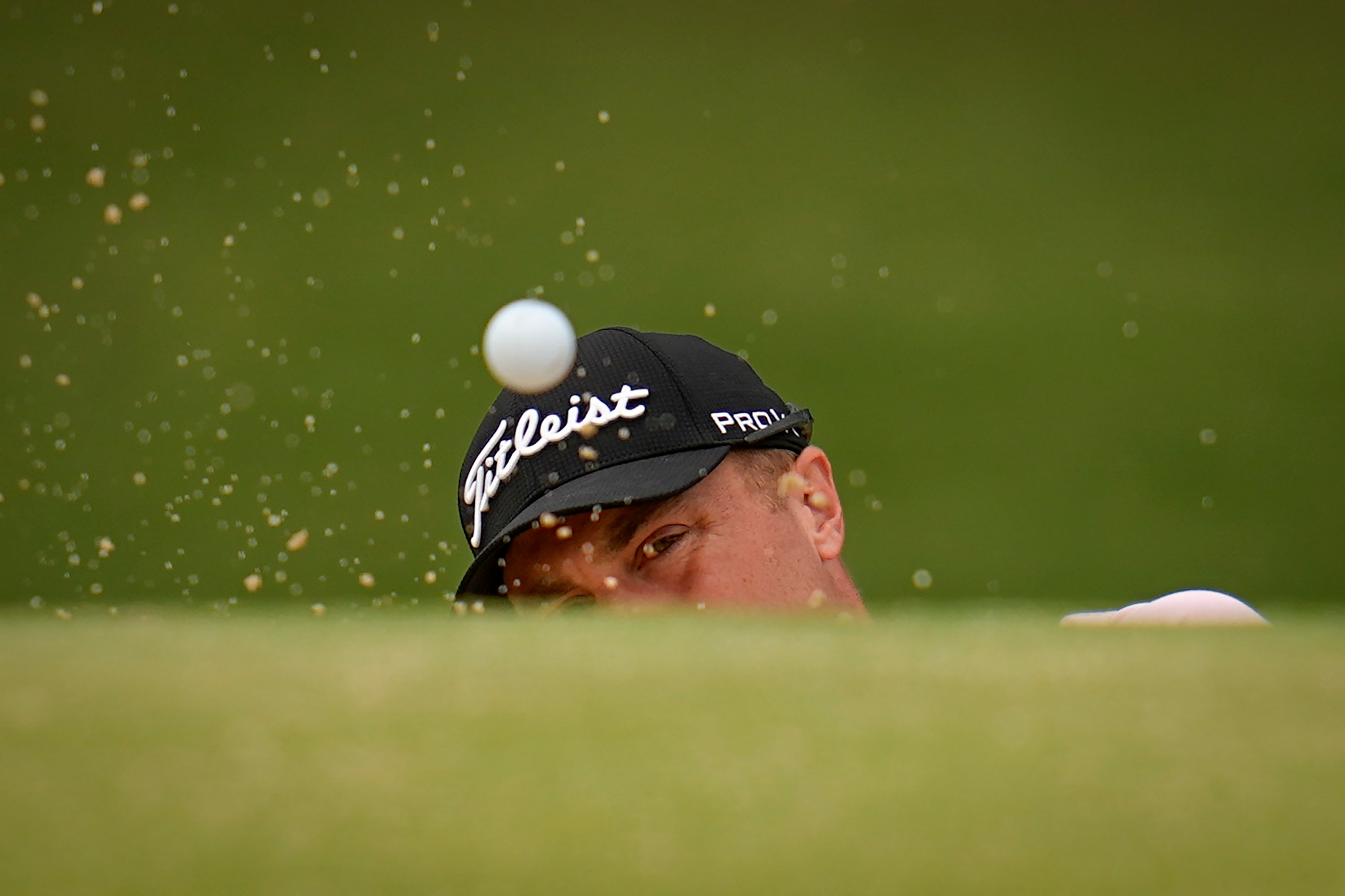 Justin Thomas hits from a bunker on the eighth hole during the final round of the US PGA Championship (Sue Ogrocki/AP)