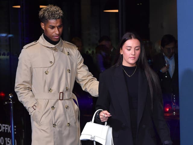 <p>Marcus Rashford and Lucia Loi attend the "Rooney" World Premiere at Home on February 09, 2022 in Manchester</p>