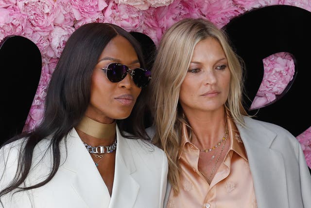 <p>Models Naomi Campbell (L) and Kate Moss attend the Dior Men’s Spring/Summer 2019 fashion show on June 23, 2018</p>