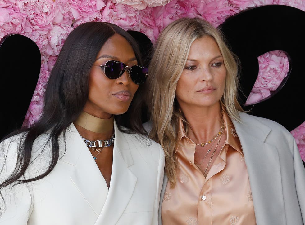 <p>Models Naomi Campbell (L) and Kate Moss attend the Dior Men’s Spring/Summer 2019 fashion show on June 23, 2018</p>