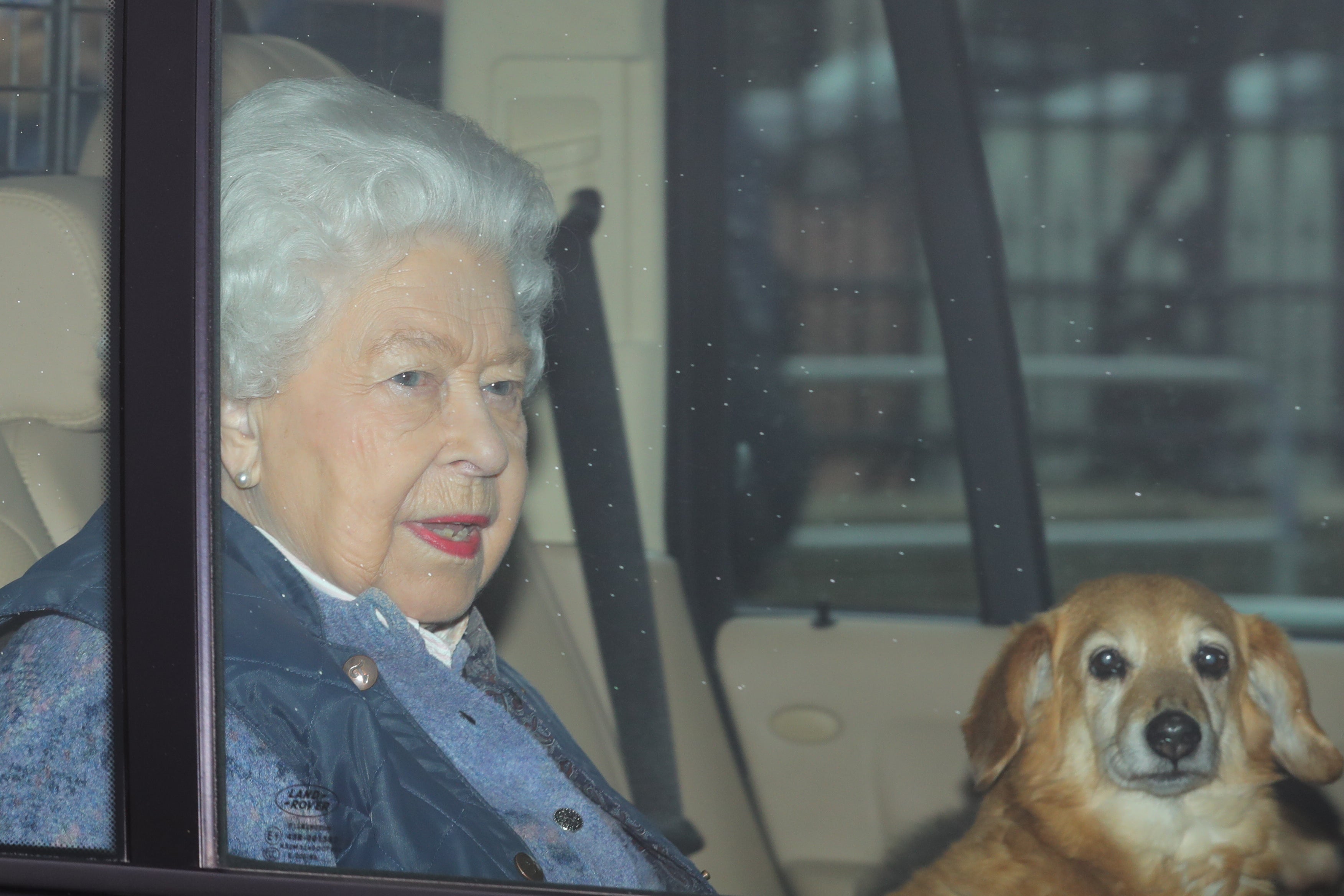 The Queen leaves Buckingham Palace with her dorgi, Candy, ahead of the first lockdown in March 2020 (Aaron Chown/PA)