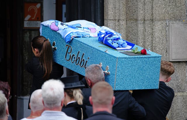 Bobbi-Anne McLeod’s coffin is carried into the Minster Church of St Andrew in Plymouth (Ben Birchall/PA)