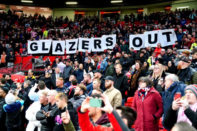 Manchester United fans protest against the Glazer family in the match against Chelsea on April 28 (Martin Rickett/PA)