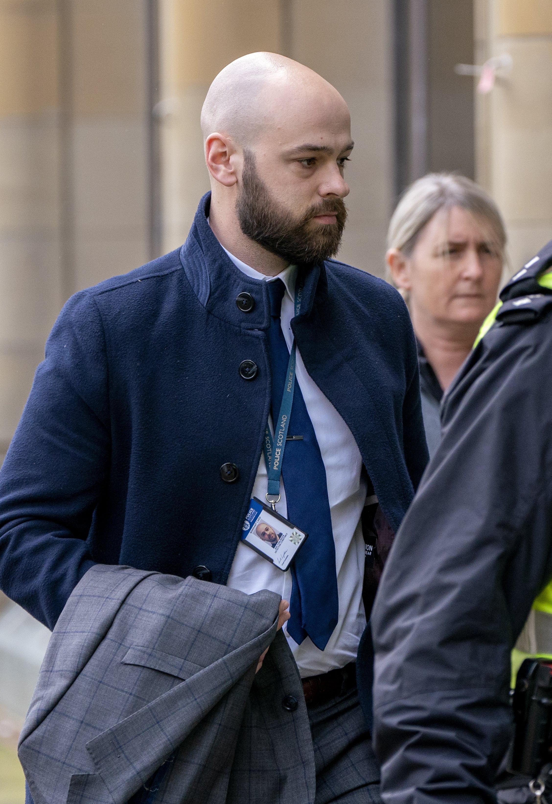 Police witness PC Ashley Tomlinson arrives at Capital House in Edinburgh for the public inquiry into Sheku Bayoh’s death (PA)
